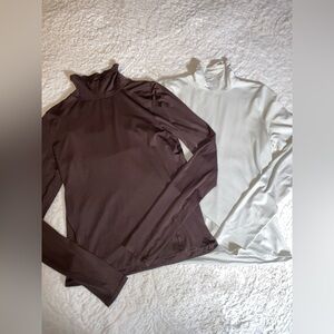 Two Lululemon Wundermost Turtlenecks